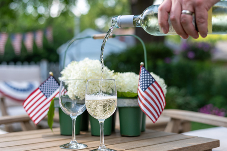 Enjoying wine in the backyard in summertime