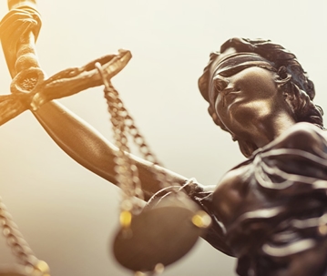 close up on lady of justice statue