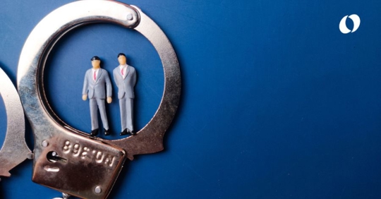 handcuffs and male figurines